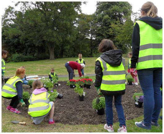 Lister Infants create a flower bed